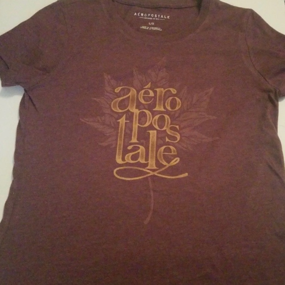 We are selling a Burgundy shirt it is a (12-14) L.
